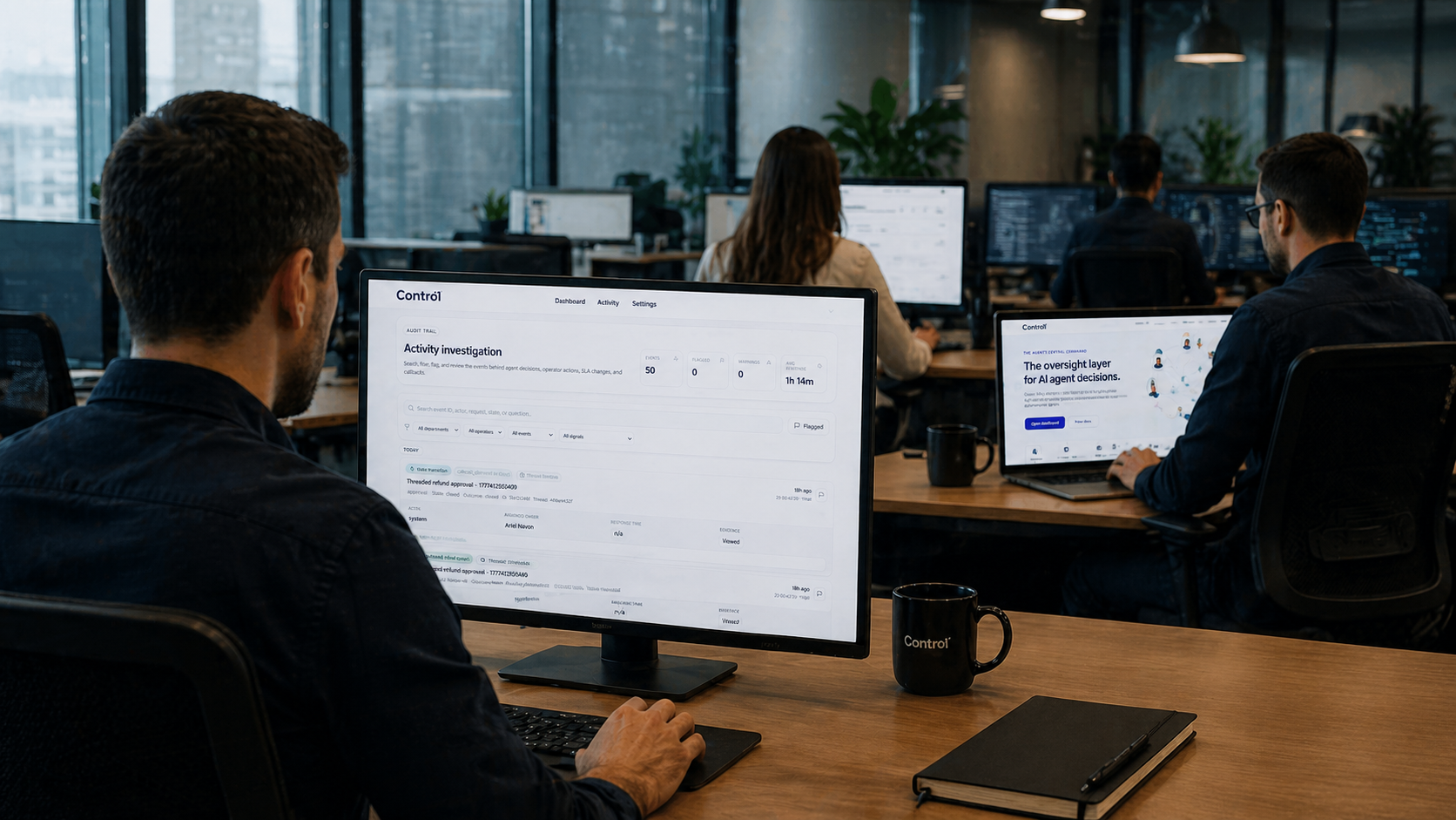 Enterprise operations room with Contro1 activity investigation displayed on a monitor
